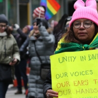 Pink hat  and sign for Unity in Diversity