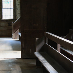 quaker meeting housing benches in sunlight