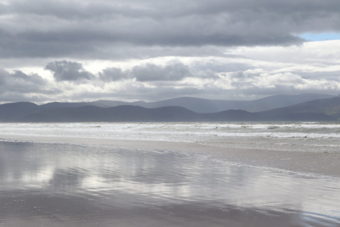 distant land, shadow mountains, silver clouds, reflected in receding water