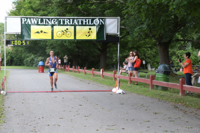 Pawling Triathlon winner crossing the finish line