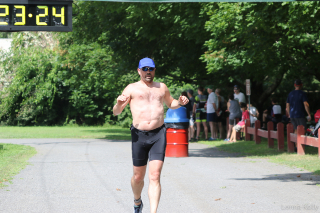 Pawling Triathlon Finisher bare chest, blue hat