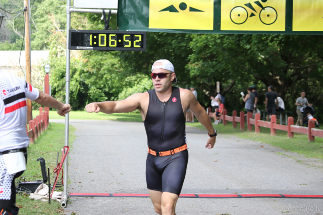 Pawling tri runner black one piece white hat