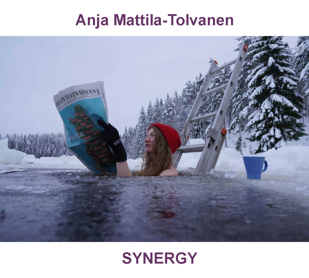 wearing hat and gloves a woman submerged in pond reads newspaper