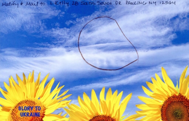 pencil circle in blue sky with drifting clouds over yellow sunflowers