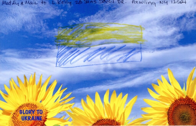 Ukrainian Flag drawn with crayon  in blue sky over yellow sunflowers