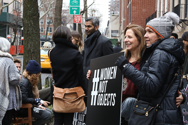 women holding sign # women not objects