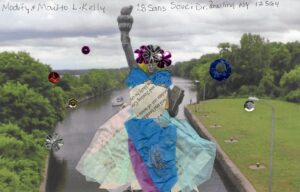 dress designed with tissue paper sparkly jewels on head added on replica Statue of Liberty positioned on Erie Canal Lock background