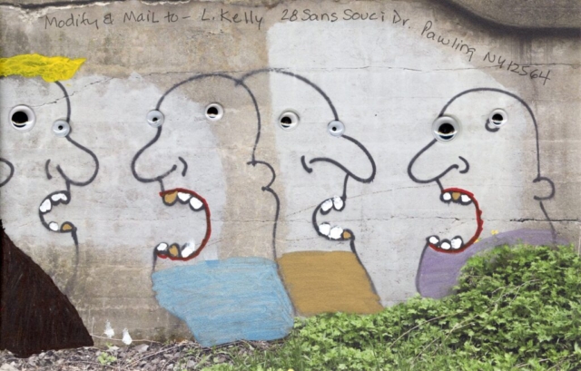 Goobly eyes and white and gold teeth added to line drawings of four heads with open mouths and big noses on cement bridge under RR track