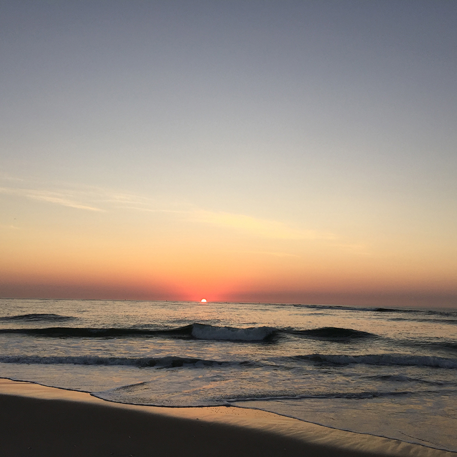 golden sunrise over calm ocean 